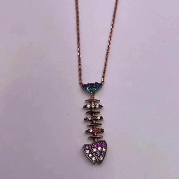 Rainbow CZ gems embellish this contemporary fishbone pendant necklace - Picture 1 of 4